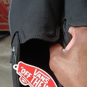 Vans Black Canvas Slip-Ons